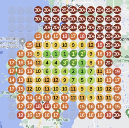 Map displaying Google Maps rankings for an HVAC contractor in Tarpon Springs, FL, showing significant improvement from low visibility (20+) to higher rankings across the service area after optimization.